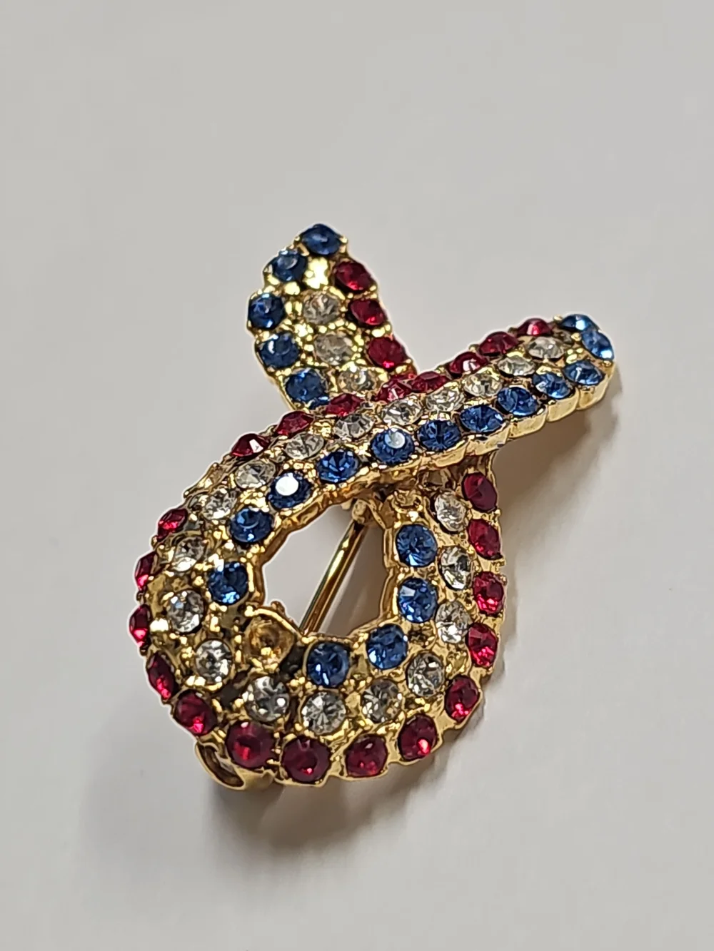 Gold-Tone Ribbon Crystal Brooch in Red, Blue, and Clear Cancer Awareness Pin